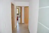 Über den Flur erreichen Sie bequem alle Räume